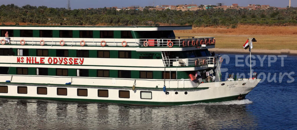 Luxurious Nile River cruise with scenic desert backdrop